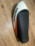 2010 Polaris 550 Iq Shift Snowmobile S10PB5BSA Orange Black Seat. Fixed Price $120.00.