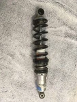 Ski Doo New Center Shock, Part # 503192182. Loc TA2. Never Used Spring. Fixed Price $225.00.